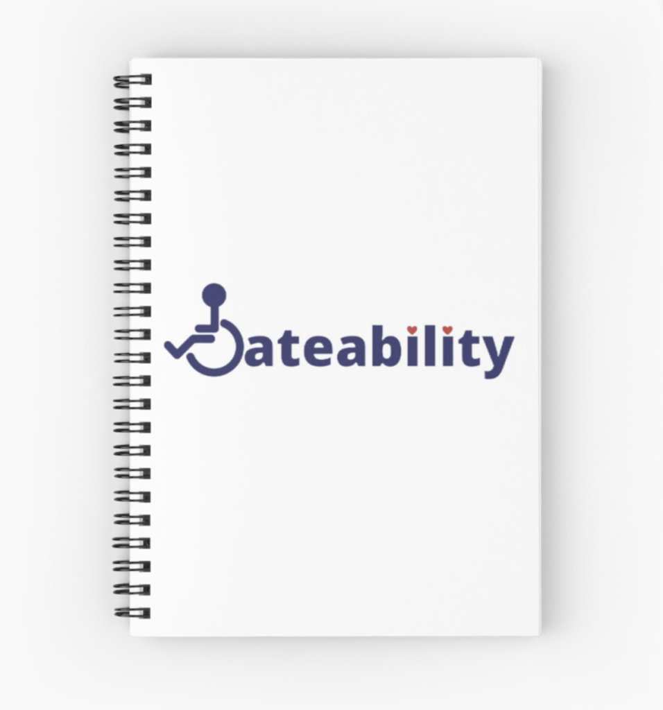 A white notebook with the Dateability logo. 