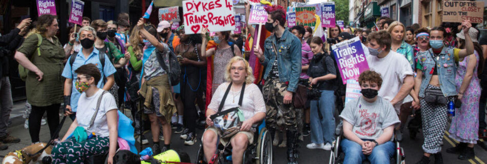 Disabled people marching in a Pride parade.
